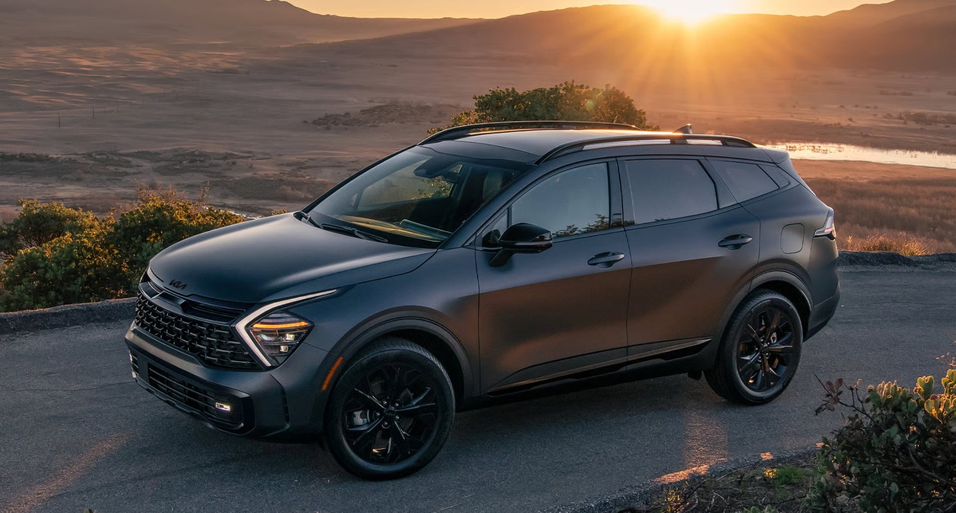 2025 Kia Sportage Plug-In Hybrid on Dirt Road